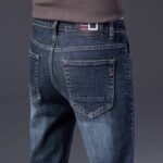 Pantaloni lunghi da uomo 2025 Jeans elasticizzato primavera e autunno casual pantaloni lunghi lisci da uomo in seta di ghiaccio sottile estate